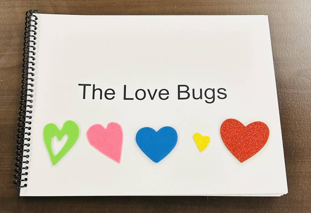The Love Bugs cover with the title and textured hearts.