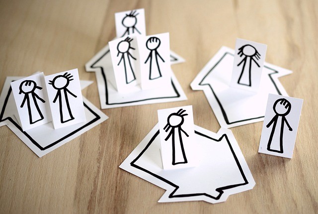 Stick figures in houses